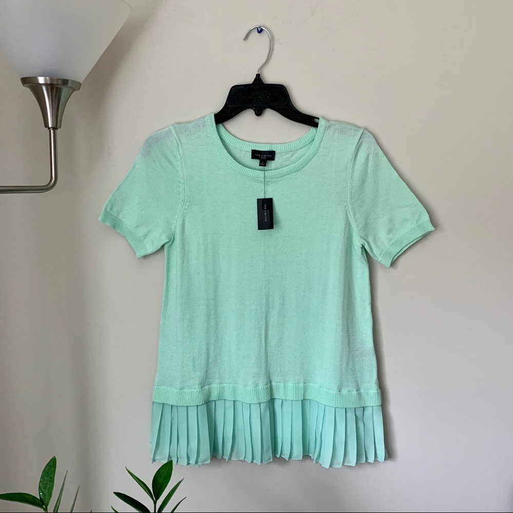 Ruffle hem tunic top